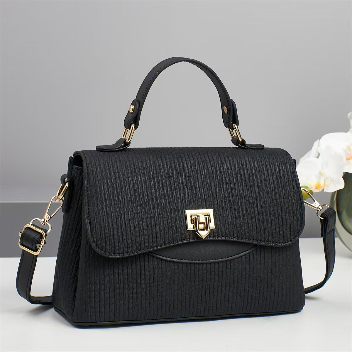 Elegant Medium Handbag With Gold Lock & Contrast Flap Black